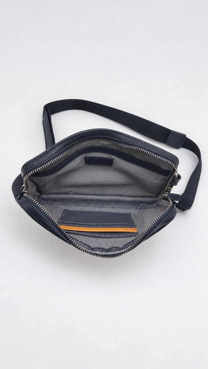 Interior of minimalist leather crossbody bag 10091 with organizer pockets